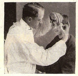 Dr. R.T. Uhls attending to a trachoma patient at Alexandropol. Near East Relief started a trachoma hospital at Seversky Post Orphanage to combat the virulent eye disease, which often led to blindness if left untreated.