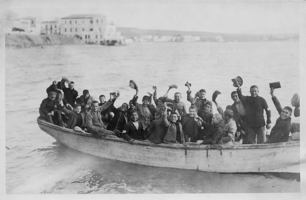 Boys in a Near East Relief boat, probably Greece. Based on their age, the boys may be graduating from the orphanage.