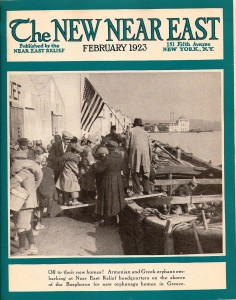 New Near East magazine cover featuring orphans at Near East Relief headquarters in Constantinople boarding a barge bound for Greece after the burning of Smyrna.