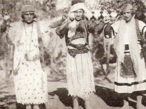 Young women dancing in traditional costumes