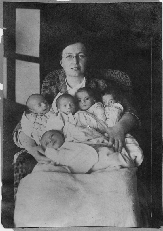 Dr. Ruth Parmelee with Armenian babies at the American Hospital in Harput, Turkey. Dr. Parmelee joined Near East Relief through American Women's Hospitals organization.