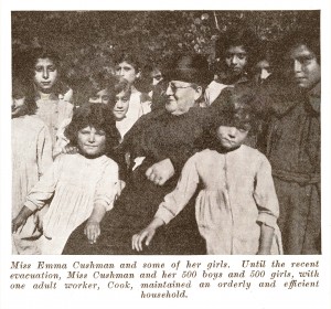 Near East Relief worker Emma Darling Cushman with young girls just prior to the evacuation from Turkey. Cushman went on to head orphanages in Greece.