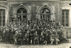 Orphanage alumni now employed in agriculture in France pose with Near East Foundation staff. Tours, France, 1934.