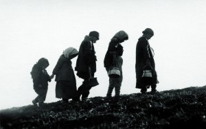 Five young people walking from Turkey to safety in Syria. A version of this photograph also appeared on the cover of the New Near East magazine in April 1923