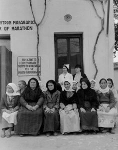 The Near East Foundation continued Near East Relief's work in Greece. Nurses like Alice Carr (standing, in black suit and hat) implemented programs in home hygiene. These programs dramatically reduced disease rates, particularly malaria, and infant mortality. 