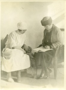 Student nurse with female relief worker.
