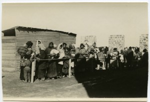 A group of refugees waiting in line