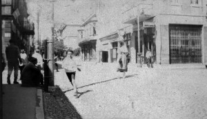 Boys running on a city street