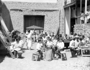 Boys and girls in an outdoor workshop