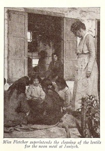 Miss Katherine Ogden Fletcher worked for Near East Relief in Caesarea, Angora, and Mersine. She was named director of the orphanage at Juniyeh, where she helped the girls to created a system of self-government. In this photograph from the New Near East magazine, Miss Fletcher watches girls clean lentils for an orphanage meal.

 