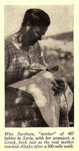 Maria Jacobsen, a Near East Relief worker from KMA, a Danish missionary organization, with a baby. The original caption from the New Near East magazine refers to Miss Jacobsen as the 