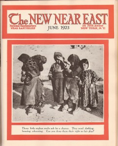 A New Near East magazine cover showing children in need of relief. The young girl at left carries a smaller child, possibly a younger sibling.