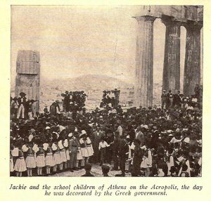 Jackie Coogan and the school children of Athens on the Acropolis, the day he was decorated by the Greek government.