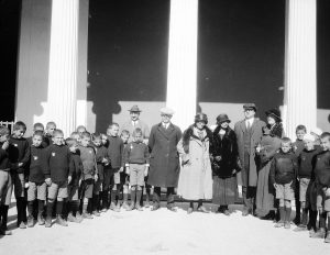Former Ambassador Morgenthau (in black coat and white hat) often brought visitors to the Zappeion to meet the children. 