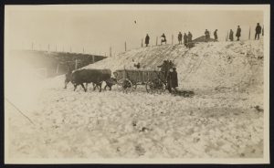 


Caption from the back: Snow fort made over a war trench


